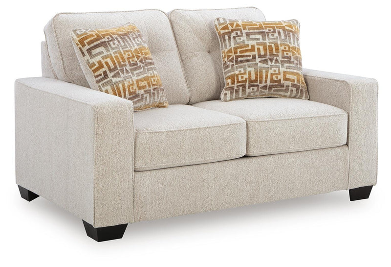 Ashley Furniture Larimer living room set featuring a sofa and loveseat with plush cushions and neutral fabric upholstery.