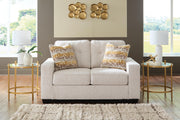 Ashley Furniture Larimer living room set with fabric sofa and matching armchair in a modern design.