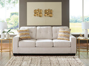 Ashley Furniture Larimer Sleeper Sofa in neutral fabric, showing the convertible sofa bed with plush cushions and modern design.