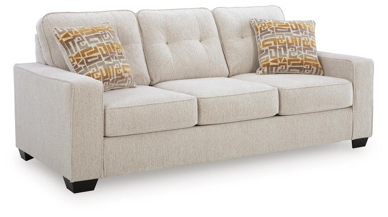Ashley Furniture Larimer sofa in a cozy living room setting, showcasing plush cushions and a modern design.