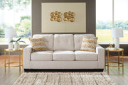 Ashley Furniture Larimer living room set with sofa and loveseat, featuring neutral upholstery and modern design.