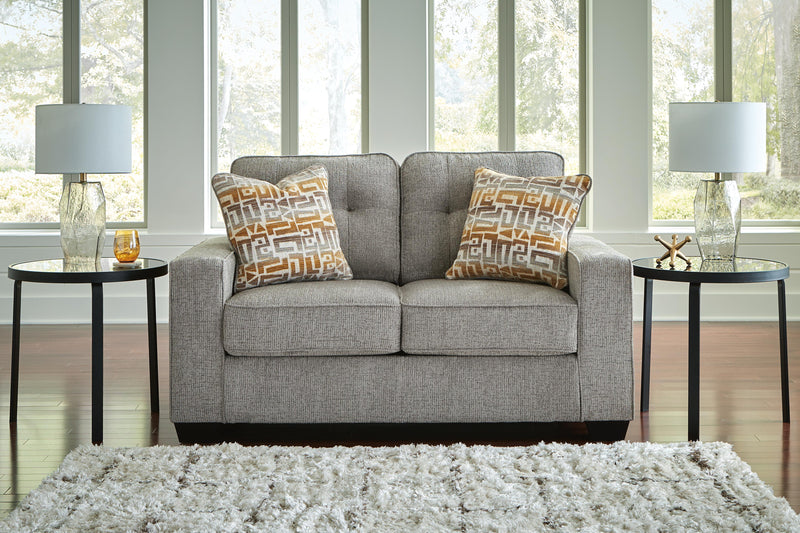 Ashley Furniture Larimer living room set with sofa and armchair featuring neutral upholstery and modern design.