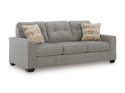 Ashley Furniture Larimer living room set with a sofa, loveseat, and armchair in a cozy, modern living space.