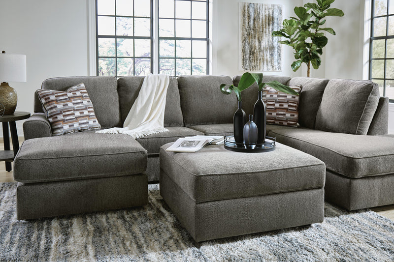 Ashley Furniture O'Phannon living room set with sofa and armchair, featuring neutral upholstery and modern design.
