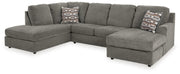 Ashley Furniture O'Phannon living room set with sofa and loveseat, upholstered in neutral fabric, in a modern home setting.