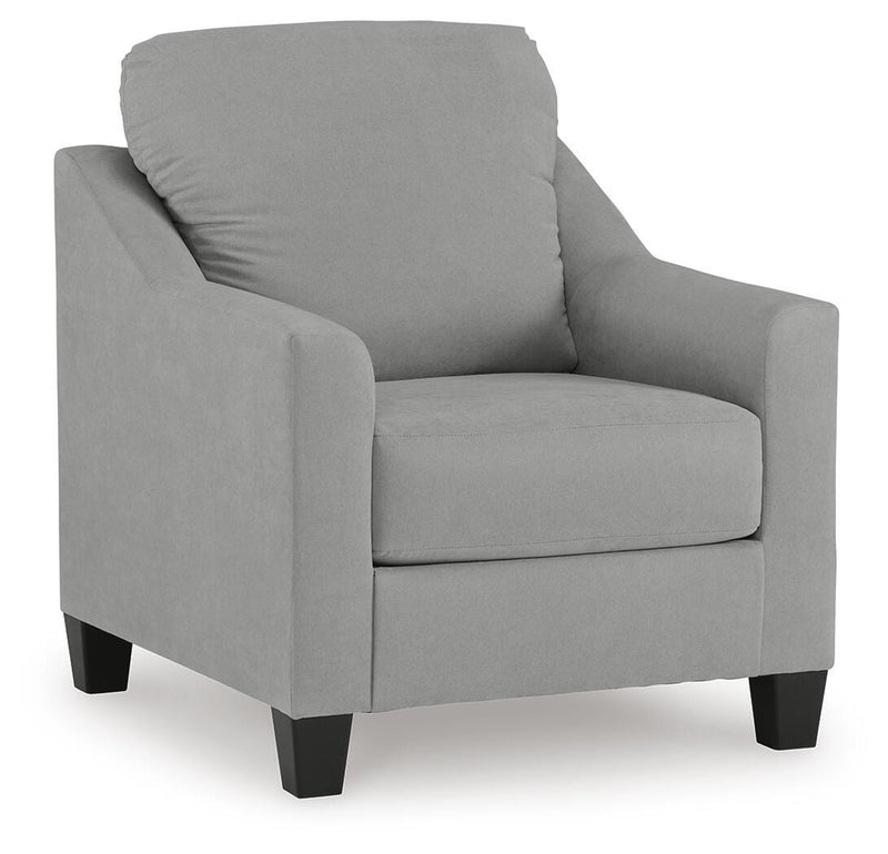 Ashley Furniture Adlai Chair with plush fabric upholstery and sleek wooden legs, shown from an angled side view.