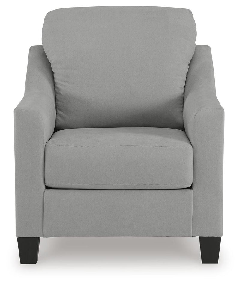 Ashley Furniture Adlai living room set with plush sofa and matching armchair, featuring neutral upholstery and modern design.