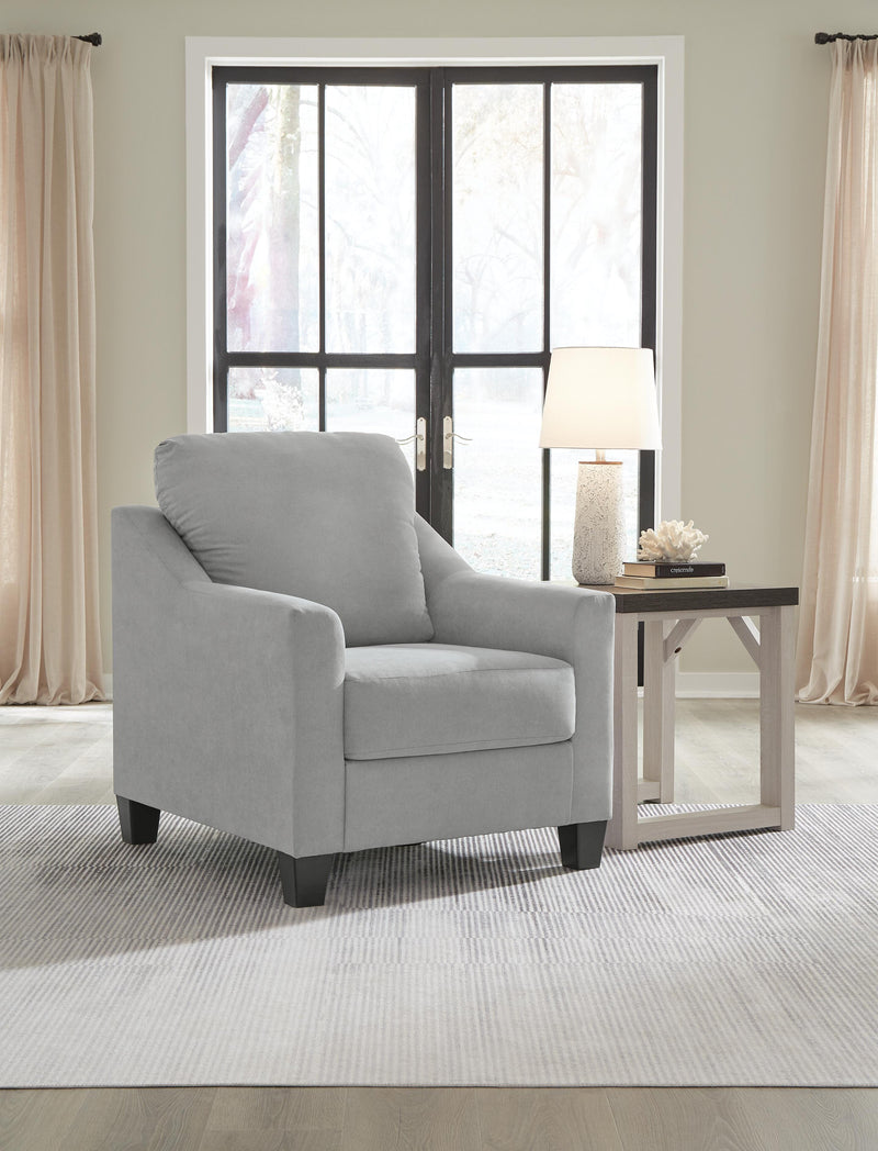Ashley Furniture Adlai living room set featuring a plush sofa and matching chairs in a modern design.