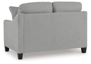 Ashley Furniture Adlai Living Room Set with sofa and armchair, featuring neutral fabric and modern design, shown from the back.