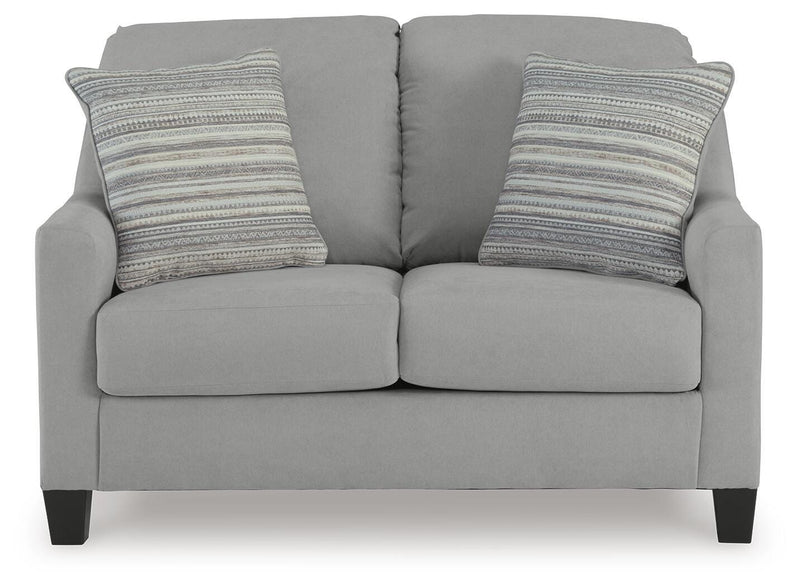 Ashley Furniture Adlai living room set featuring a sofa and loveseat with plush cushions and modern design in a cozy living space.