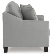 Ashley Furniture Adlai loveseat with plush fabric and modern design, featuring cushioned armrests and comfortable seating.