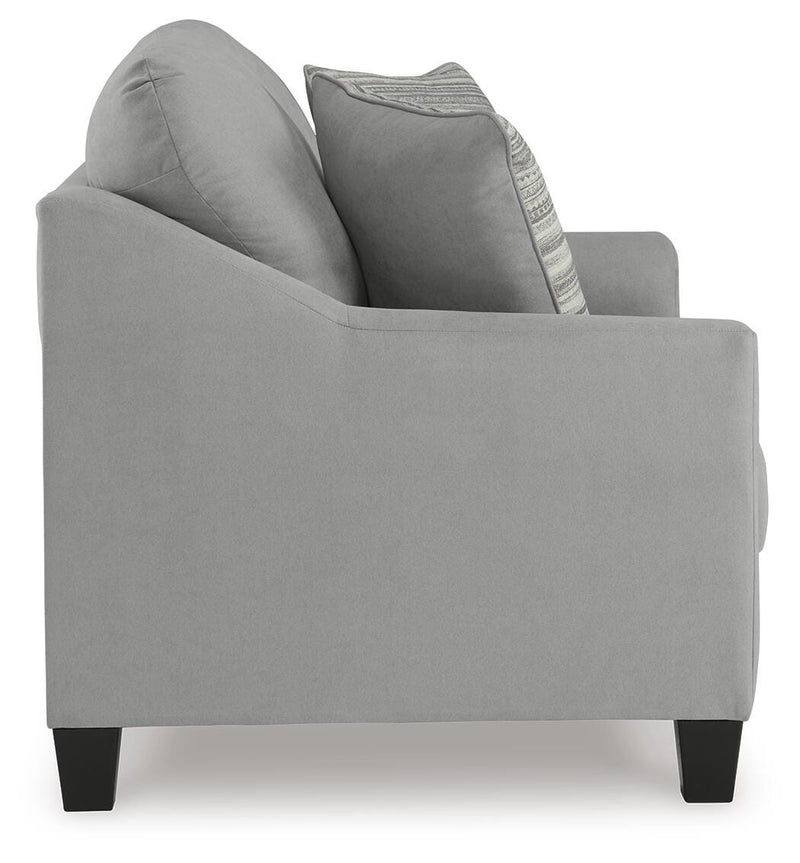 Ashley Furniture Adlai loveseat with plush fabric and modern design, featuring cushioned armrests and comfortable seating.