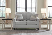 Adlai Loveseat by Ashley Furniture featuring plush fabric upholstery and comfortable cushioned seating.