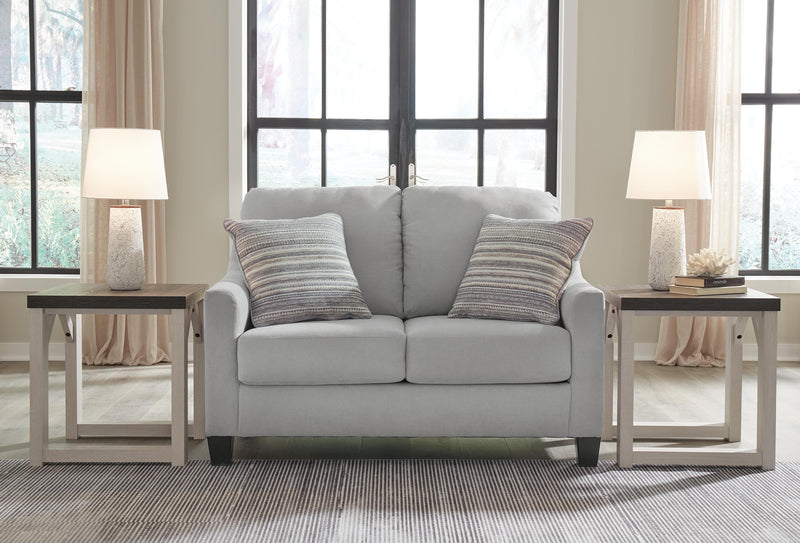 Adlai Loveseat by Ashley Furniture featuring plush fabric upholstery and comfortable cushioned seating.