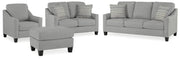 Ashley Furniture Adlai living room set with sofa and armchair in a contemporary design, shown with neutral upholstery and wooden legs.