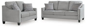 Ashley Furniture Adlai living room set featuring a sofa and matching chairs with plush cushions and modern design.