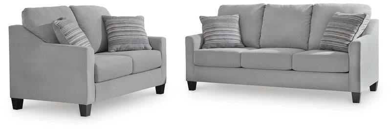 Ashley Furniture Adlai living room set featuring a sofa and matching chairs with plush cushions and modern design.