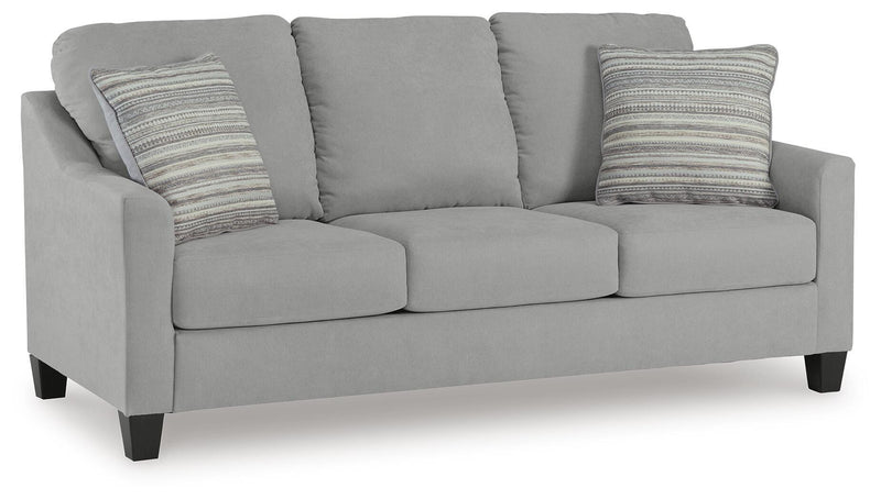 Ashley Furniture Adlai sofa shown from an angled view, featuring plush cushions and modern design in a neutral fabric.
