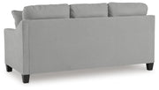 Adlai sofa by Ashley Furniture, showing a stylish sectional with plush cushions and modern design in a living room setting.
