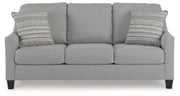 Ashley Furniture Adlai sofa sleeper with plush fabric, shown in a head-on view highlighting its modern design and comfortable sleeping surface.