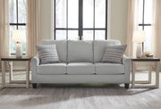 Ashley Furniture Adlai sofa with plush cushions and neutral fabric, showcasing a modern living room style.