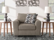 Oversized Triston-Peaks Ashley Furniture chair with plush fabric and wide cushioned seat in a modern living room setting.