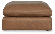 Ashley Furniture Emilia living room set featuring a sofa and loveseat in a modern design with plush cushions and neutral fabric.