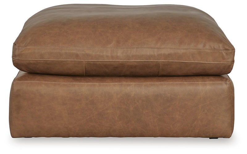 Ashley Furniture Emilia living room set featuring a sofa and loveseat in a modern design with plush cushions and neutral fabric.