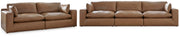 Ashley Furniture Emilia living room set with sofa and loveseat in a modern fabric, featuring plush cushions and neutral tones.