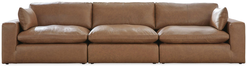 Ashley Furniture Emilia living room set featuring a plush sofa and matching chairs in a modern design.