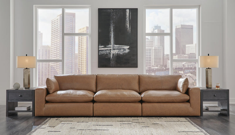 Ashley Furniture Emilia living room set with sofa, loveseat, and armchair in neutral upholstery, stylish and comfortable for modern living rooms.