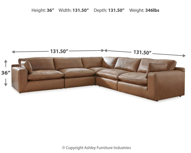 Ashley Furniture Emilia Sectional sofa with beige upholstery, plush cushions, and modern design in a spacious living room setting.
