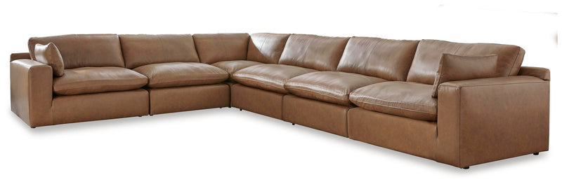 Ashley Furniture Emilia living room set featuring a stylish sofa and matching armchair in a modern design.