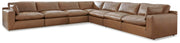 Ashley Furniture Emilia living room set with sofa, loveseat, and armchair featuring plush cushions and modern design.