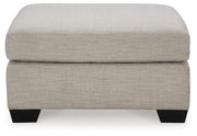 Ashley Furniture Mahoney living room set featuring a sofa and loveseat with plush cushions and modern design.