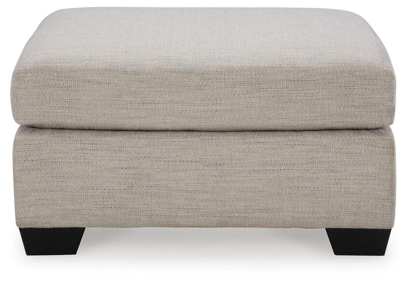 Ashley Furniture Mahoney living room set featuring a sofa and loveseat with plush cushions and modern design.