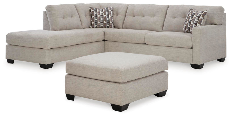 Ashley Furniture Mahoney living room set featuring a sofa, loveseat, and armchair with plush upholstery and modern design.