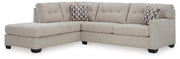 Ashley Furniture Mahoney living room set with sofa and loveseat in a contemporary design, shown in a cozy living space.