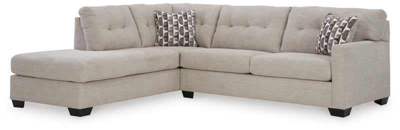 Ashley Furniture Mahoney living room set with sofa and loveseat in a contemporary design, shown in a cozy living space.