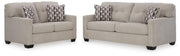 Ashley Furniture Mahoney living room set with sofa and armchair, featuring neutral fabric upholstery and modern design.