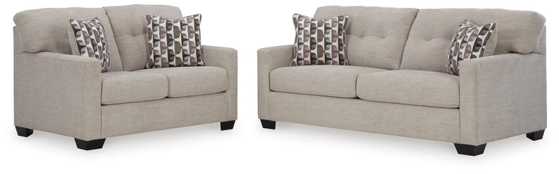 Ashley Furniture Mahoney living room set with sofa and armchair, featuring neutral fabric upholstery and modern design.