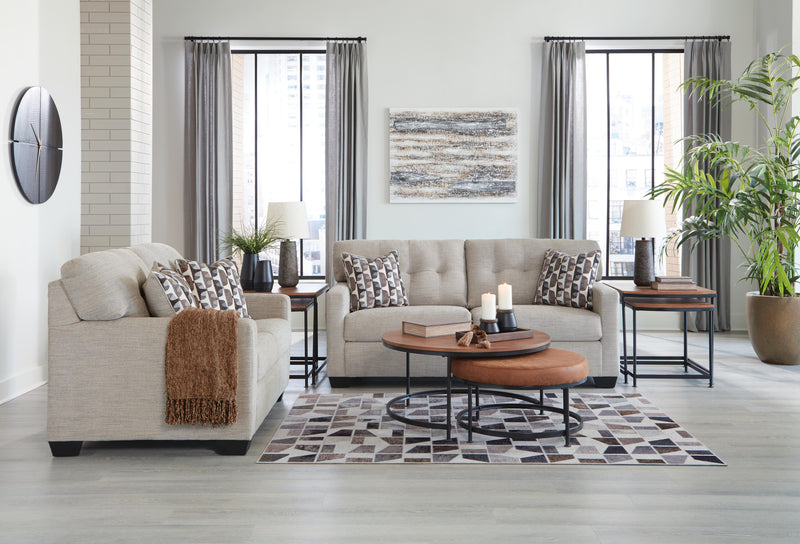 Ashley Furniture Mahoney living room set with sofa and armchair in a modern design, featuring neutral fabric upholstery.