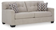 Ashley Furniture Mahoney living room set with sofa and armchair, featuring neutral upholstery and modern design.