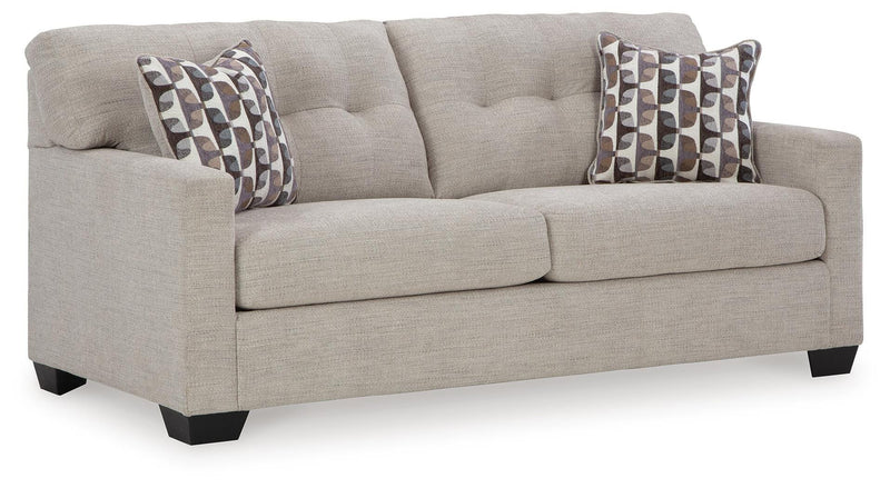 Ashley Furniture Mahoney living room set with sofa and armchair, featuring neutral upholstery and modern design.