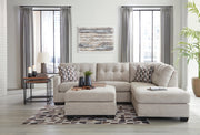 Ashley Furniture Mahoney living room set with sofa, loveseat, and coffee table in a modern design, shown in a stylish living space.