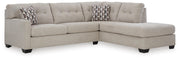 Ashley Furniture Mahoney living room set with sofa and armchair, featuring neutral fabric upholstery and modern design.
