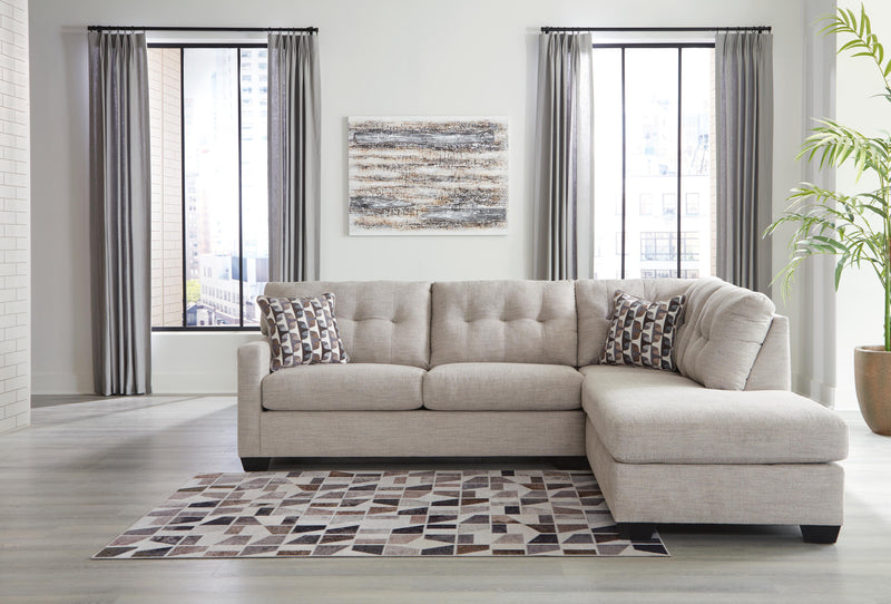 Ashley Furniture Mahoney living room set featuring a sofa and loveseat with neutral fabric and modern design.
