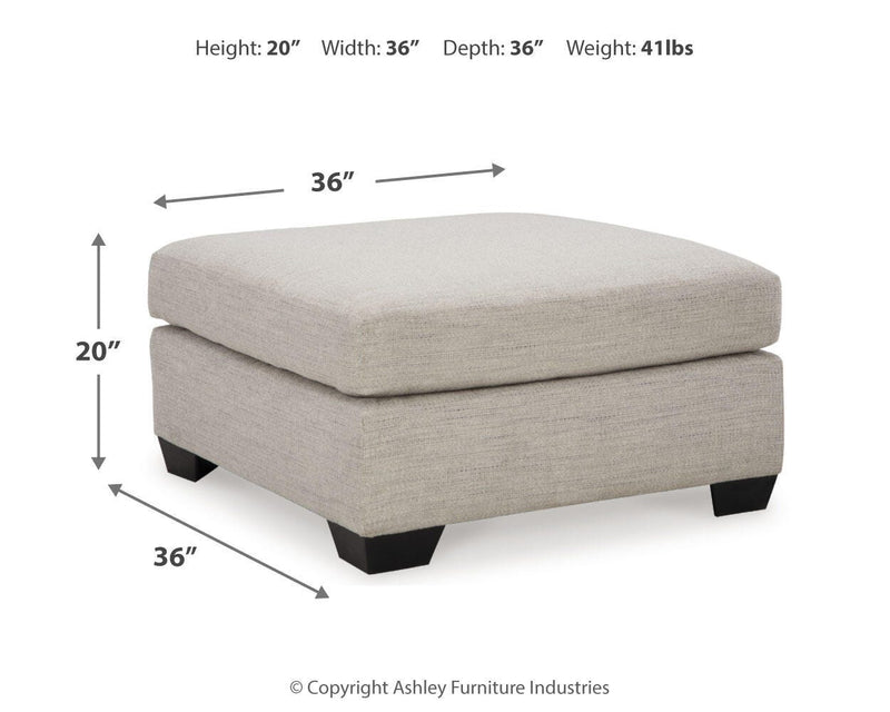 Ashley Mahoney living room set featuring a sofa and loveseat with plush cushions and neutral fabric upholstery.