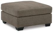 Ashley Furniture Mahoney living room set featuring a sofa, loveseat, and armchair with neutral fabric upholstery in a modern style.