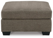 Ashley Furniture Mahoney living room set with sofa and loveseat, featuring plush cushions and modern design.